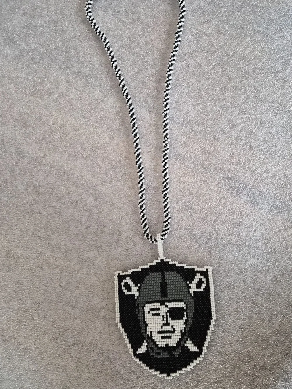 Hand Made Black and White Raiders Beaded Shield